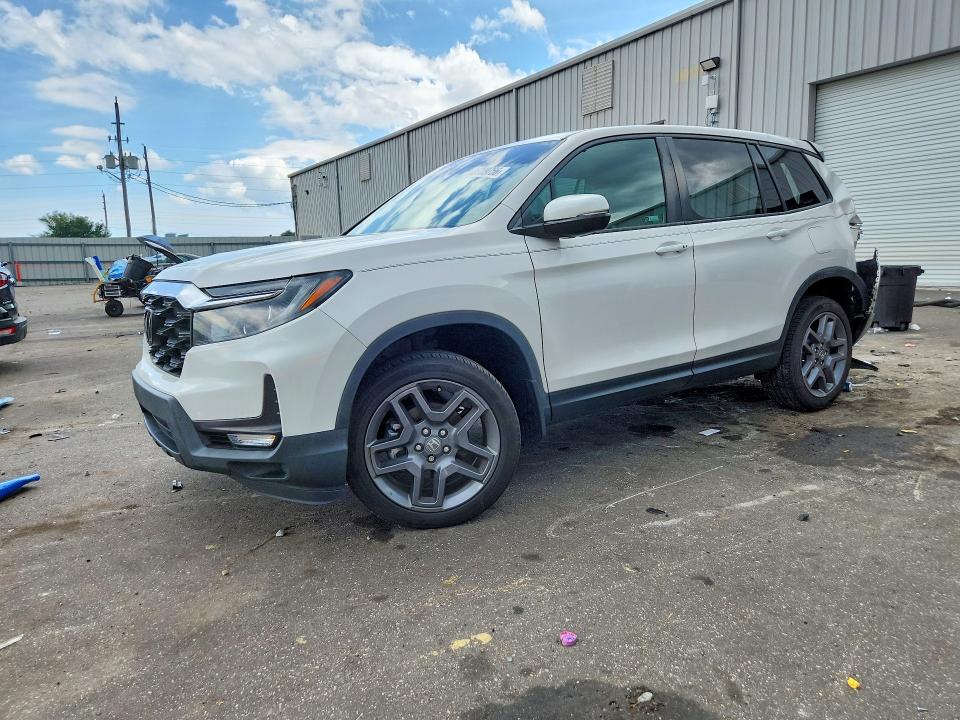 2023 Honda Passport VIN 5FNYF8H57PB030057 — COPART salvage auction photo