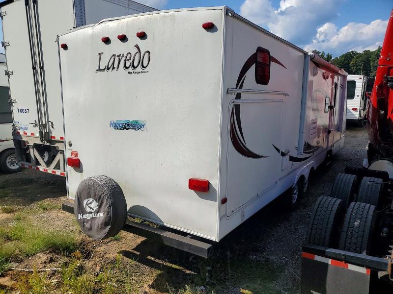 2011 Keystone Laredo VIN 4YDT29123BV602423 COPART salvage auction — ROOF, MI - CERTIFICATE OF TITLE, sold $825 on 2026-09-08 (photo 4)