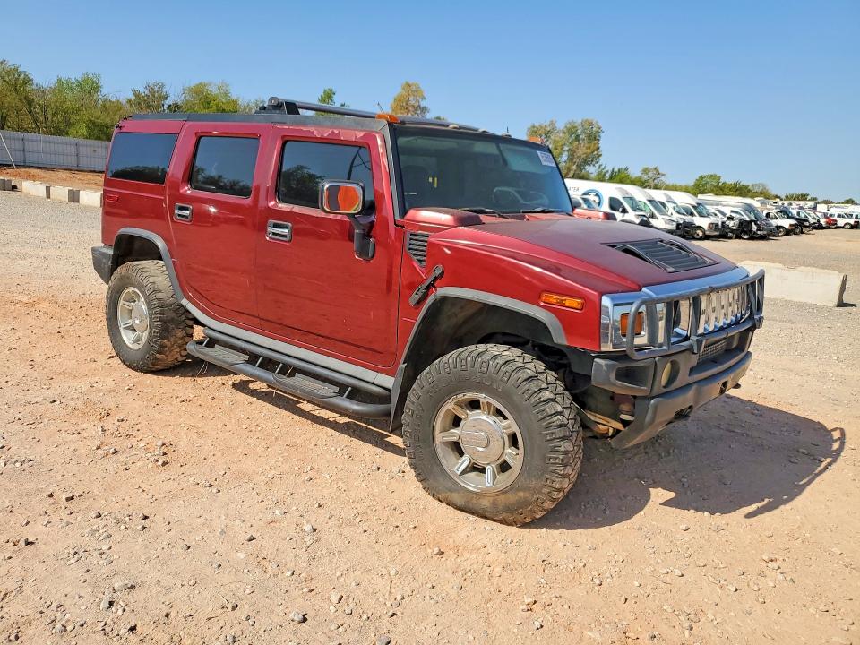 2003 Hummer H2 VIN 5GRGN23U33H146861 COPART salvage auction — ROOF, OK - CERT OF TITLE-REBUILT, sold $3,500 on 2026-09-26 (photo 4)