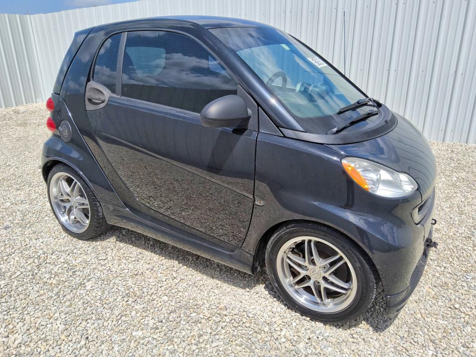 2009 Smart Fortwo VIN WMEEJ31X79K233571 COPART salvage auction — MINOR DENT/SCRATCHES, FL - CERTIFICATE OF TITLE, sold $2,700 on 2026-08-20 (photo 4)