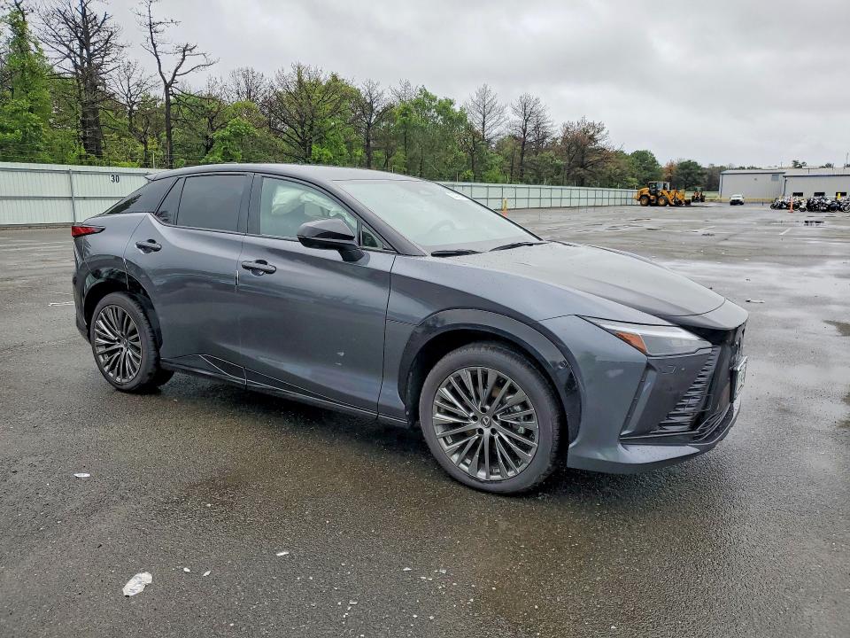 2023 Lexus Rz VIN JTJAAAAB8PA020635 COPART salvage auction — SIDE, Ny - Mv-907A Salvage Certificate, sold $14,300 on 2026-08-14 (photo 4)