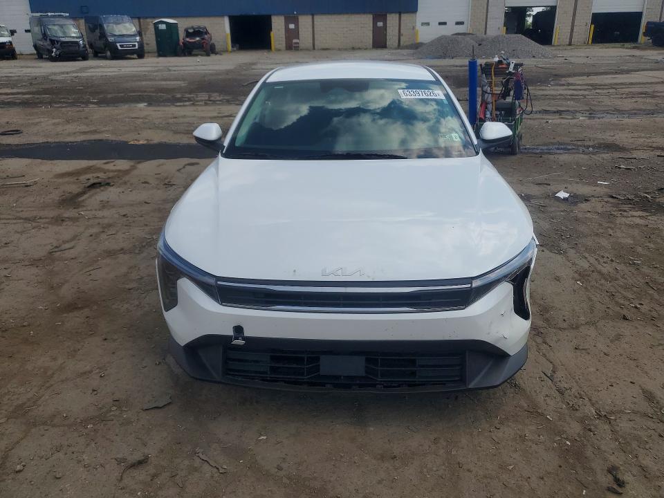 2026 Kia K4 VIN 3KPFT4DE1TE277332 COPART salvage auction — SIDE, Fl - Dlr Only Salvage/Rebuildable (P), sold $9,100 on 2026-08-18 (photo 5)