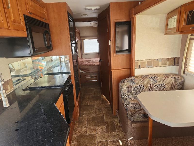 2011 Foresriver VIN 1F66F5DY3B0A05074 COPART salvage auction — SIDE, NM - CERTIFICATE OF TITLE, sold $7,500 on 2026-09-08 (photo 6)