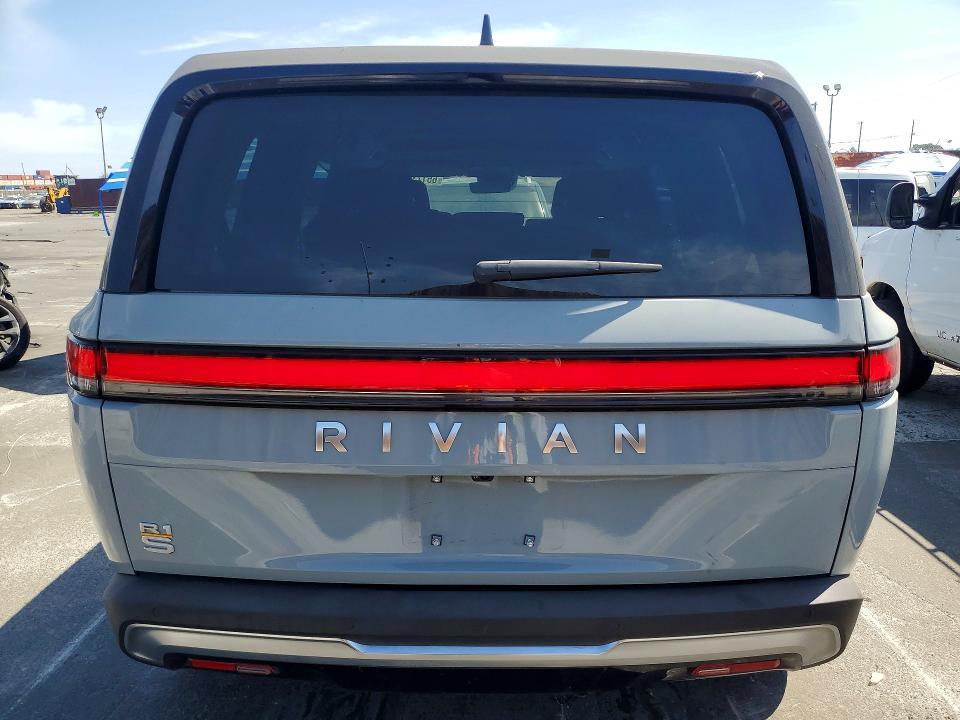 2023 Rivian R1s VIN 7PDSGABA8PN029509 COPART salvage auction — WATER/FLOOD, Ca - Salvage Certificate, sold $28,500 on 2026-09-02 (photo 6)