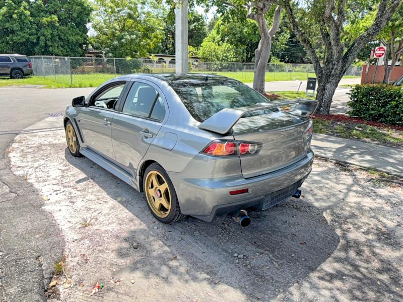 2012 Mitsubishi Lancer evolution VIN JA32W8FV7CU010819 COPART salvage auction — NORMAL WEAR, Fl - Cert Of Title Slvg Rebuildable (P), sold $9,100 on 2026-09-16 (photo 3)