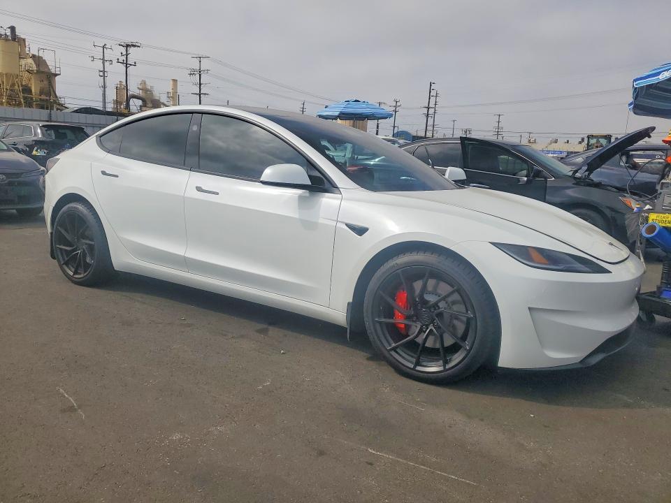 2026 Tesla Model 3 VIN 5YJ3E1ETXTF156382 COPART salvage auction — SIDE, CA - SALVAGE CERTIFICATE, sold $20,700 on 2026-09-21 (photo 4)