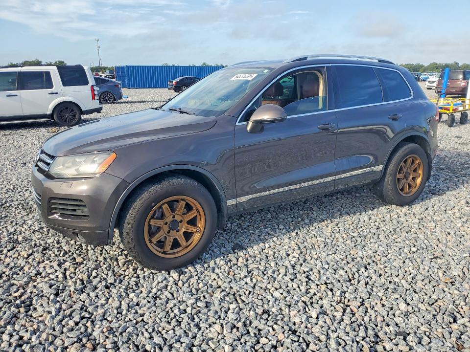 2012 Volkswagen Touareg VIN WVGFK9BP0CD005534 COPART salvage auction — NORMAL WEAR, Salvage Title, sold $2,750 on 2026-08-11 (photo 1)