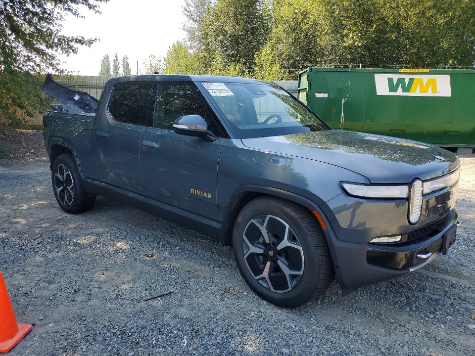 2022 Rivian R1t VIN 7FCTGAAA9NN011282 COPART salvage auction — REAR END, Wa - Bill Of Sale, sold $21,300 on 2026-08-17 (photo 4)