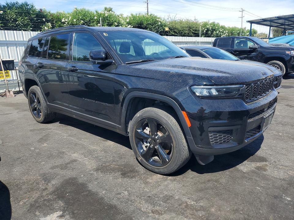 2023 Jeep Cherokee VIN 1C4RJKAG3P8705561 COPART salvage auction — SIDE, Ca - Salvage Certificate, sold $8,000 on 2026-09-29 (photo 4)