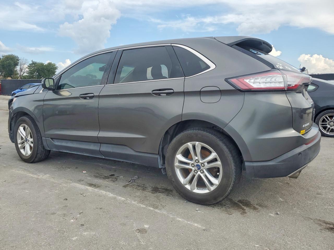 2016 Ford Edge VIN 2FMPK3J98GBB56458 COPART salvage auction — Minor Dent/Scratches, FL - CERTIFICATE OF TITLE, sold $950 on 2026-09-08 (photo 2)