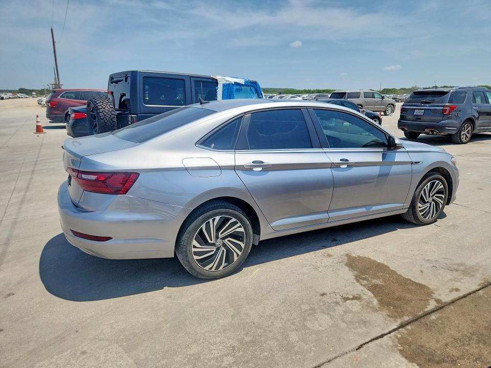 2021 Volkswagen Jetta VIN 3VWE57BUXMM088877 COPART salvage auction — SIDE, Tx - Salvage Vehicle Title, sold $8,100 on 2026-08-24 (photo 3)