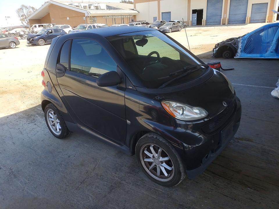 2009 Smart Fortwo VIN WMEEJ31X79K273021 COPART salvage auction — FRONT END, Ca - Dis/Dlr/Exp Only Clean Title, sold $300 on 2026-08-13 (photo 4)