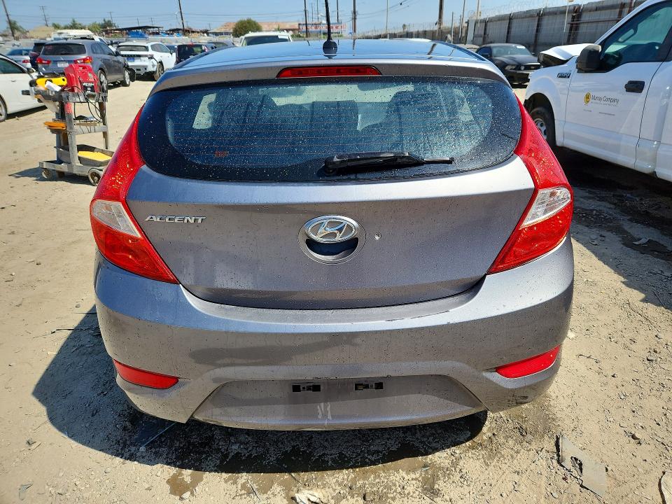 2014 Hyundai Accent VIN KMHCT5AE4EU141788 COPART salvage auction — NORMAL WEAR, Ca - Dis/Dlr/Exp Only Clean Title, sold $925 on 2026-08-20 (photo 6)