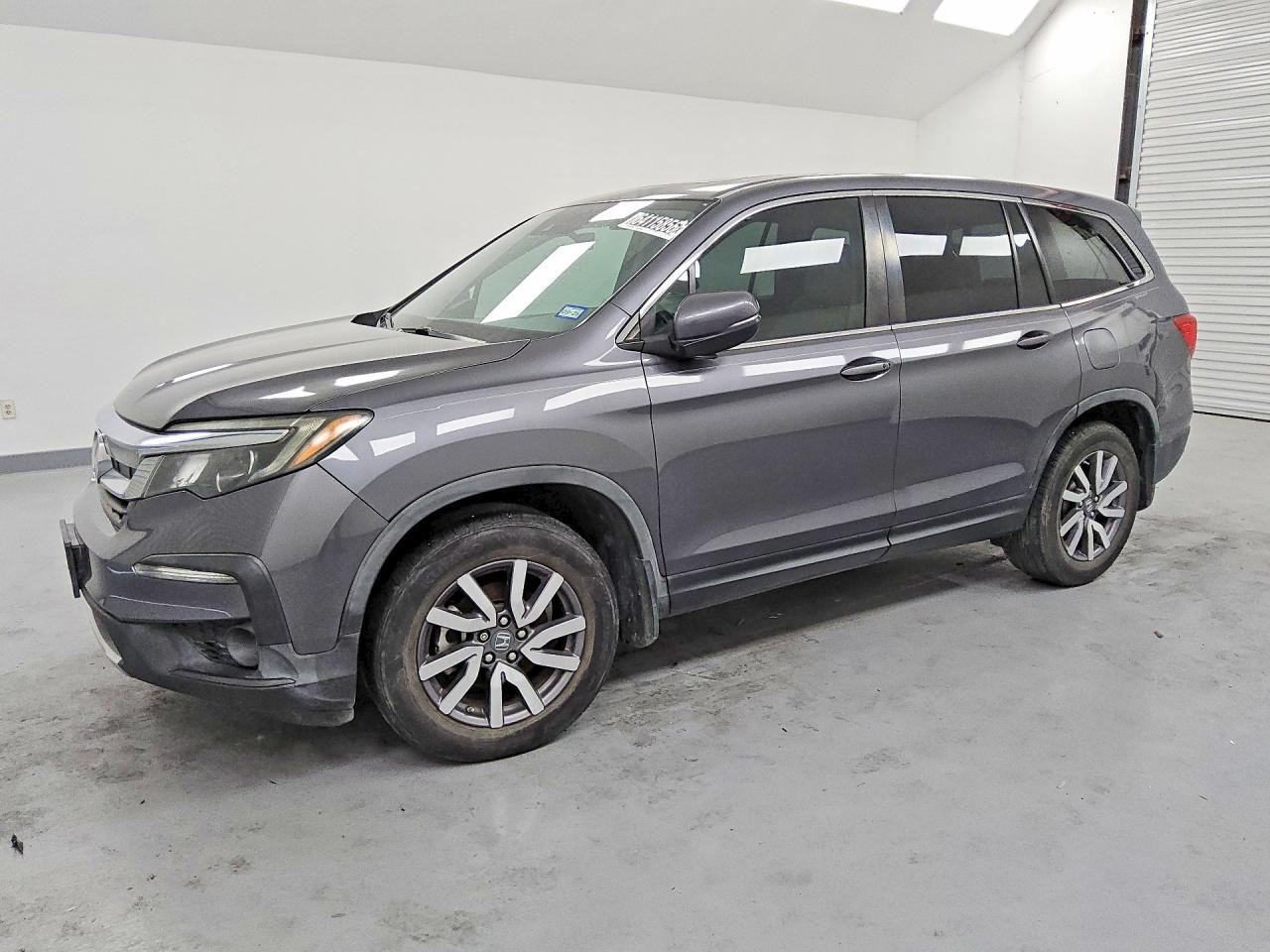 2020 Honda Pilot VIN 5FNYF5H51LB011027 — COPART salvage auction photo