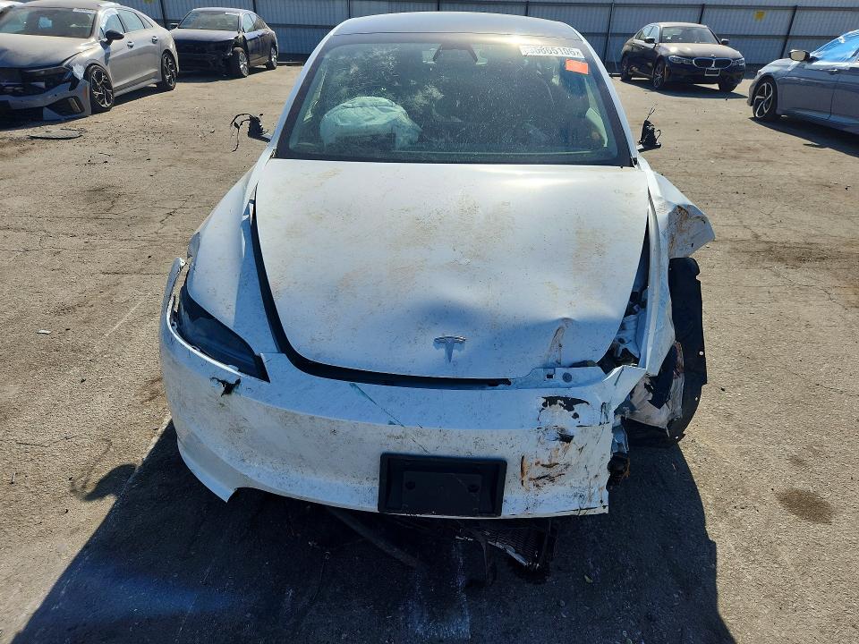 2025 Tesla Model 3 VIN 5YJ3E1EAXSF078800 COPART salvage auction — FRONT END, Ca - Salvage Certificate, sold $6,100 on 2026-10-02 (photo 5)