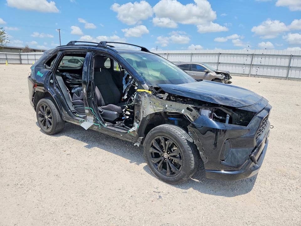 2023 Toyota Rav4 VIN JTM16RFVXPD091629 COPART salvage auction — ALL OVER, Tx - Salvage Vehicle Title, sold $11,100 on 2026-08-27 (photo 4)