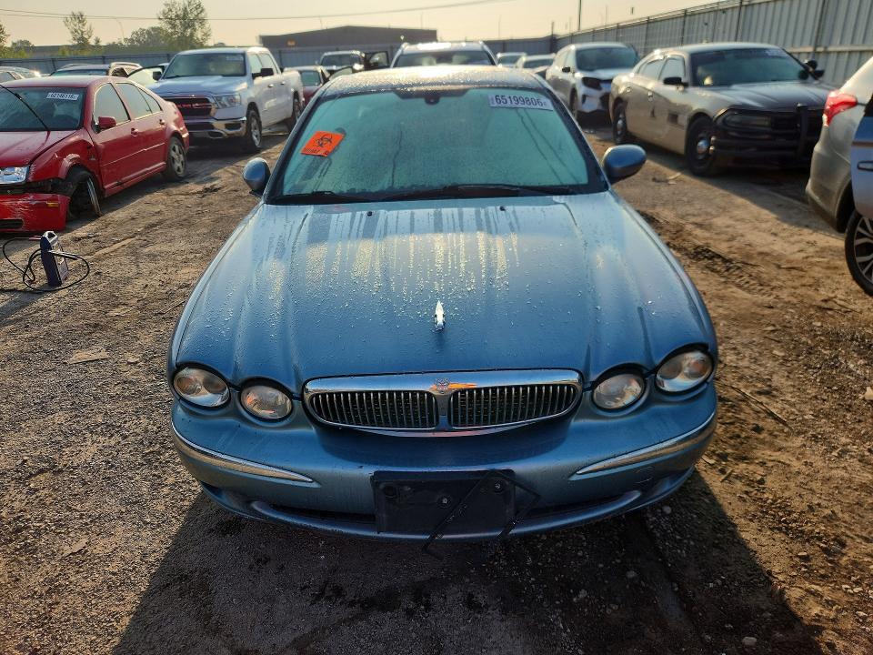 2004 Jaguar X type VIN SAJEA51C24WD95363 COPART salvage auction — WATER/FLOOD, IL - CERTIFICATE OF TITLE, sold $275 on 2026-09-14 (photo 5)