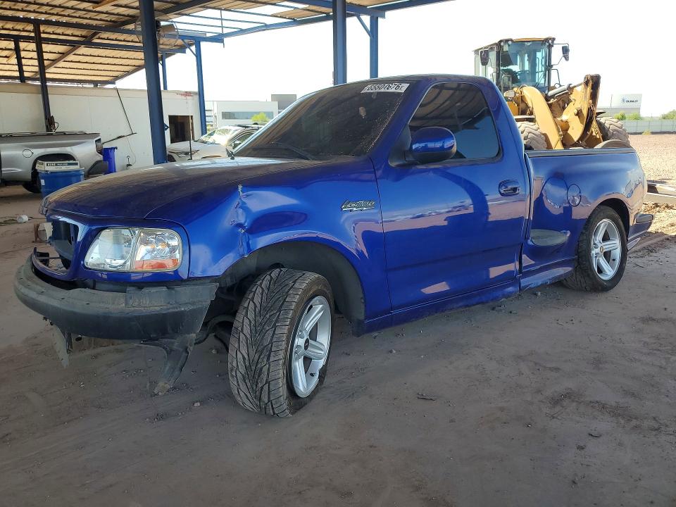 2004 Ford F-150 lightning VIN 2FTRF07334CA49262 — COPART salvage auction photo