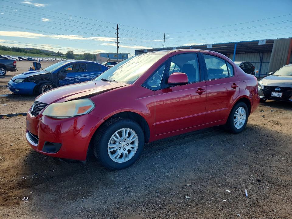 2013 Suzuki Sx4 VIN JS2YC5A39D6100395 COPART salvage auction — FRONT END, CO - SALVAGE TITLE, sold $550 on 2026-09-16 (photo 1)