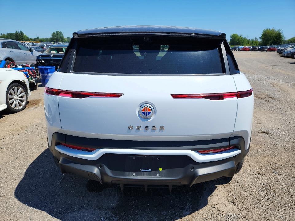 2023 Fisker VIN VCF1EBU25PG010666 COPART salvage auction — SIDE, On - Permit No Brand - Unfit, sold $12,400 on 2026-09-17 (photo 6)