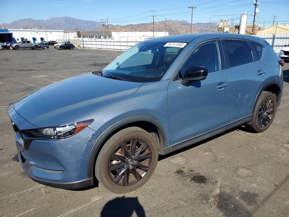 2021 Mazda Cx-5 VIN JM3KFACY4M0395506 — COPART salvage auction photo