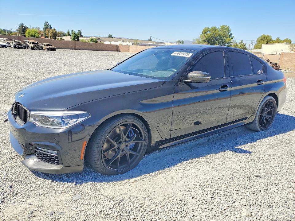 2018 BMW M5 VIN WBAJB9C53JB035077 — COPART salvage auction photo