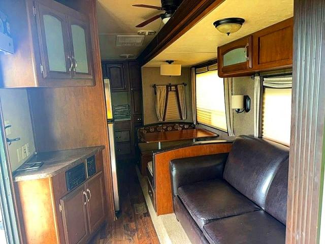 2015 Forest river Wildwood VIN 4X4TWDL25FM054874 COPART salvage auction — MINOR DENT/SCRATCHES, OH - CERT OF TITLE-REPOSSESSION (P), sold $7,500 on 2026-09-08 (photo 9)