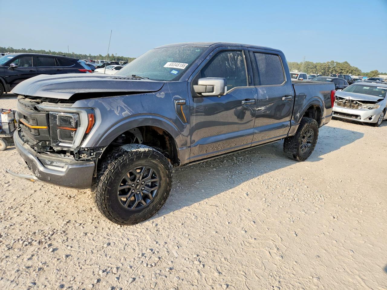 2023 Ford F-150 Lightning VIN 1FTEW1E83PFC59677 — COPART salvage auction photo