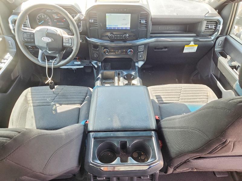 2023 Ford F-150 lightning VIN 1FTEW1C52PKF38909 COPART salvage auction — SIDE, TX - SALVAGE VEHICLE TITLE, sold $13,100 on 2026-08-21 (photo 8)