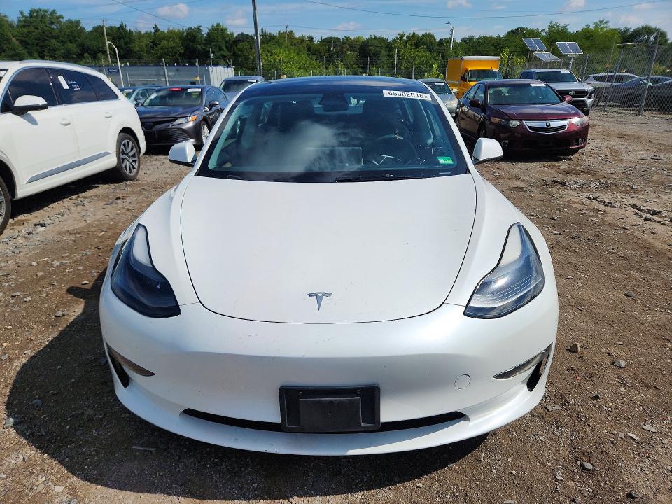 2023 Tesla Model 3 VIN 5YJ3E1EA7PF566075 COPART salvage auction — SIDE, Md - Certificate Of Title, sold $10,600 on 2026-09-03 (photo 5)