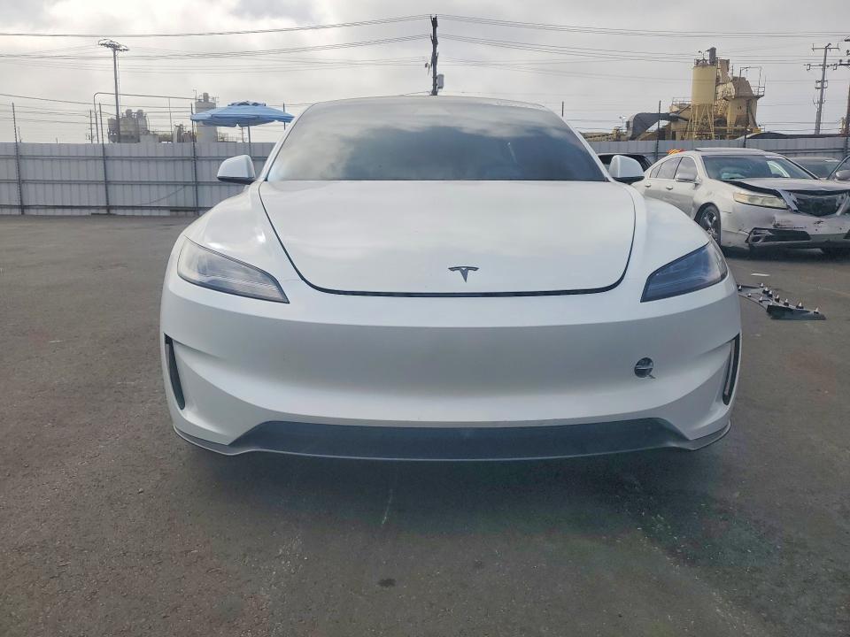 2026 Tesla Model 3 VIN 5YJ3E1ETXTF156382 COPART salvage auction — SIDE, CA - SALVAGE CERTIFICATE, sold $20,700 on 2026-09-21 (photo 5)