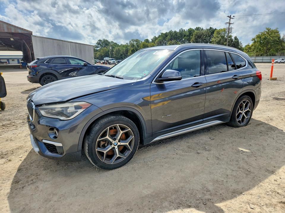 2016 BMW X1 VIN WBXHT3C31GP880843 COPART salvage auction — MINOR DENT/SCRATCHES, LA - CERTIFICATE OF TITLE (P), sold $800 on 2026-09-17 (photo 1)