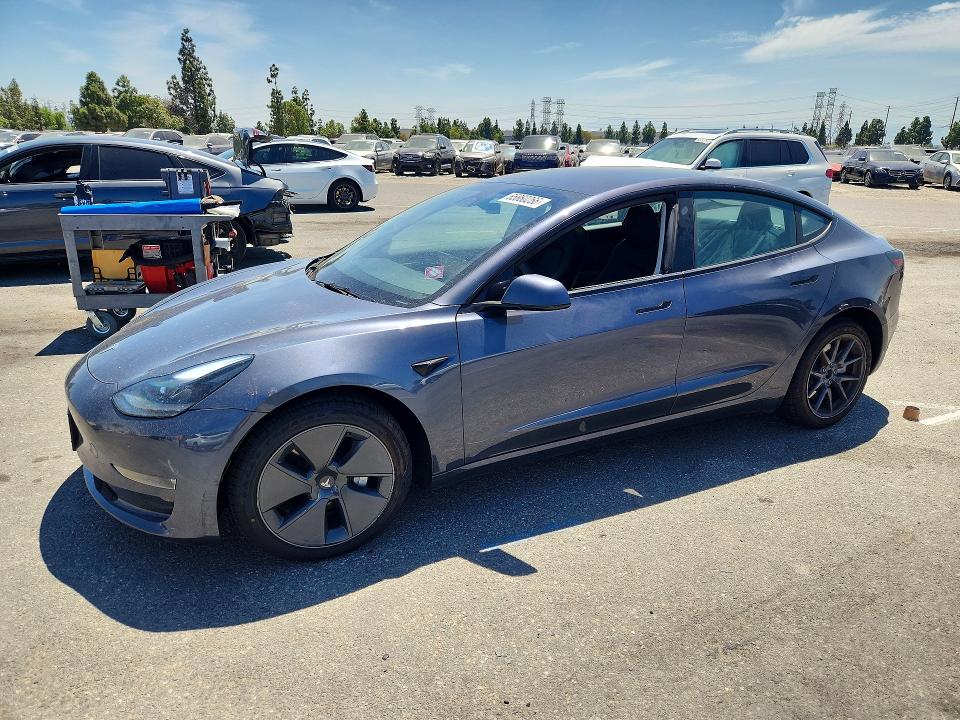 2023 Tesla Model 3 VIN 5YJ3E1EA4PF692569 — COPART salvage auction photo