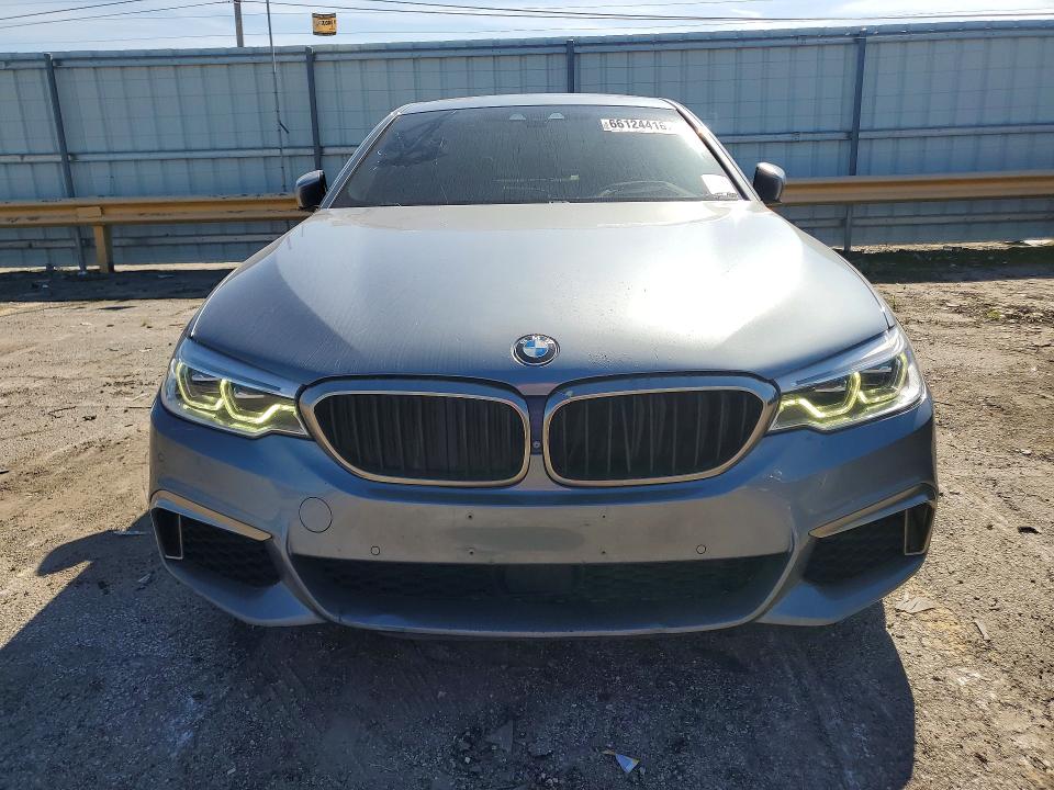 2018 BMW M550i xdrive VIN WBAJB9C5XJB035853 COPART salvage auction — REAR END, IL - CERTIFICATE OF TITLE, sold $10,700 on 2026-10-05 (photo 5)