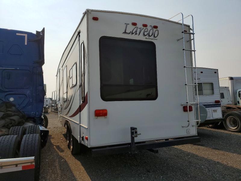 2011 Keystone Laredo VIN 4YDF26621BE601713 COPART salvage auction — ROOF, MT - CERTIFICATE OF TITLE TOTALED, sold $700 on 2026-09-29 (photo 3)