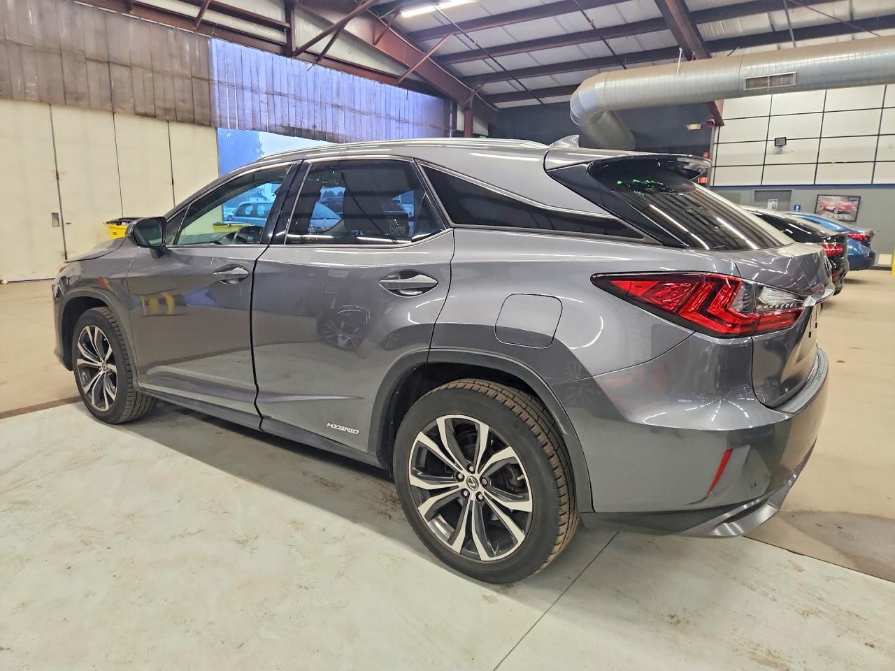 2018 Lexus Rx 450h VIN 2T2BGMCA9JC024896 COPART salvage auction — Minor Dent/Scratches, CT - CERTIFICATE OF TITLE (P), sold $14,400 on 2026-09-15 (photo 2)