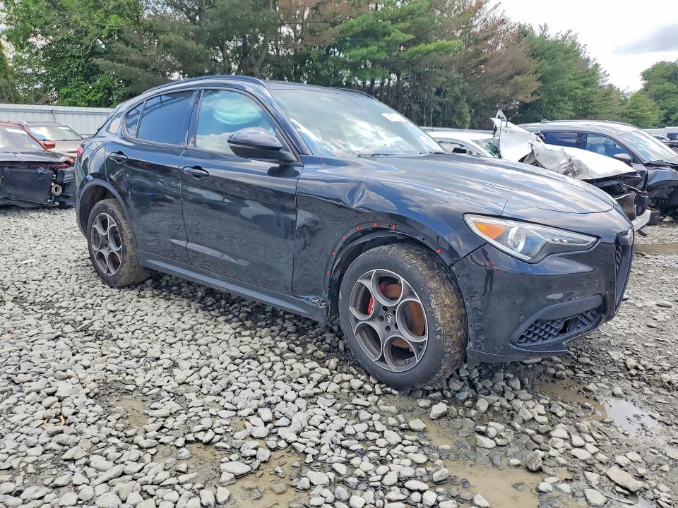 2022 Alfa romeo Stelvio VIN ZASPAKAN9N7D30629 COPART salvage auction — SIDE, Nj - Certificate Of Title, sold $3,550 on 2026-09-23 (photo 4)