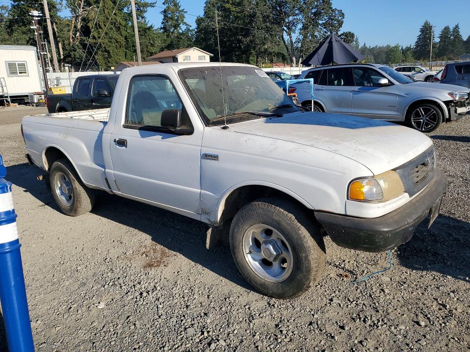 1999 Mazda VIN 4F4YR12C8XTM00362 COPART salvage auction — REAR END, Wa - Vehicle Cert Of Ownership-Titl, sold $725 on 2026-09-08 (photo 4)