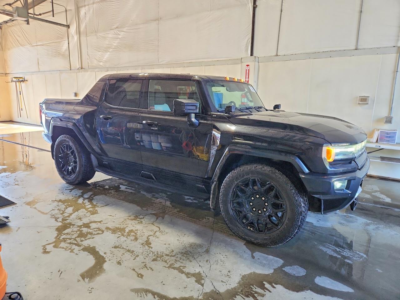 2025 Gmc Hummer pickup VIN 1GT40DDB3SU120102 COPART salvage auction — Normal Wear, AK - CERTIFICATE OF VEHICLE TITLE, sold $69,500 on 2026-09-01 (photo 4)