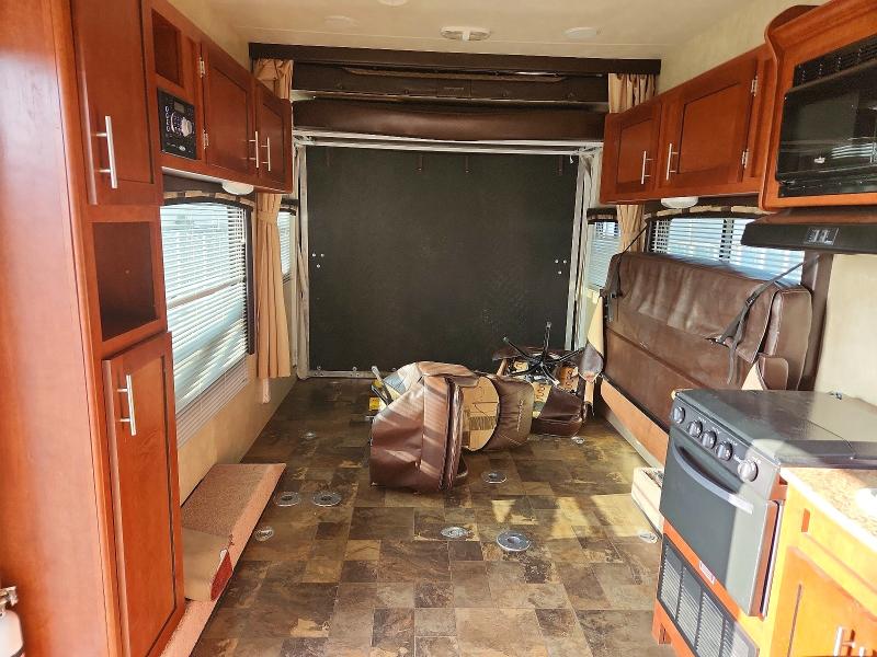 2014 Frrv VIN 4X4TSHA24EC002145 COPART salvage auction — HAIL, CO - CERTIFICATE OF TITLE, sold $8,700 on 2026-09-01 (photo 6)