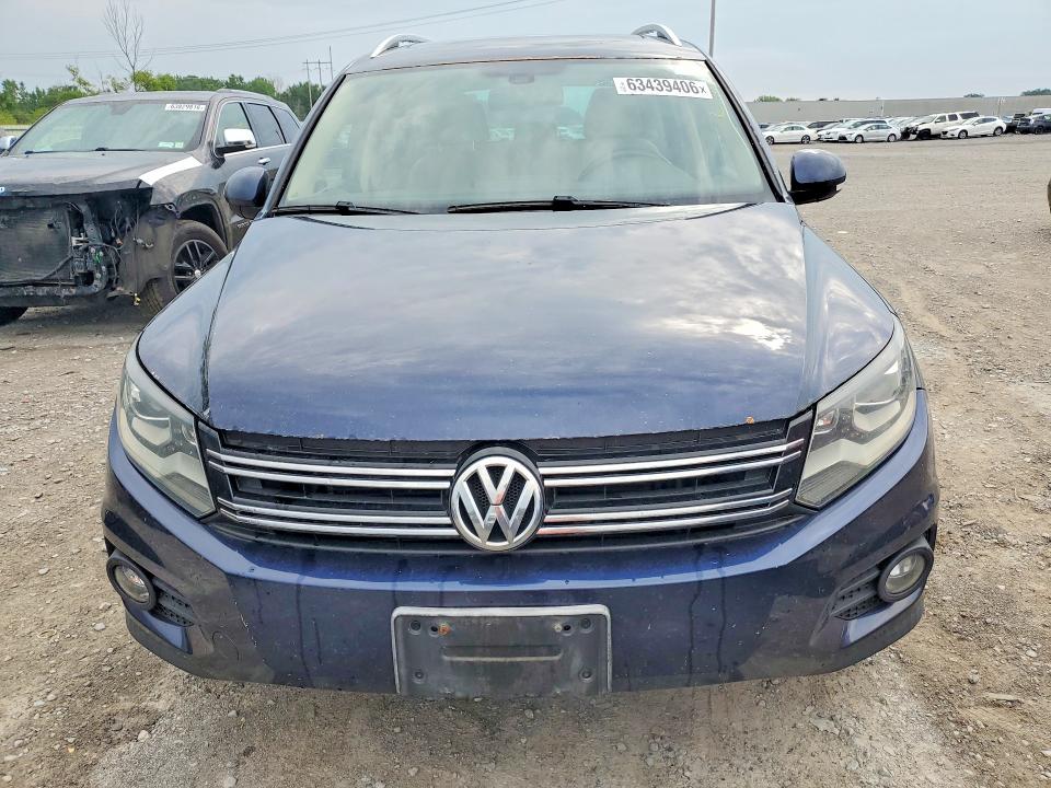 2013 Volkswagen Tiguan VIN WVGBV3AXXDW561117 COPART salvage auction — NORMAL WEAR, Co - Certificate Of Title, sold $1,641 on 2026-08-17 (photo 5)