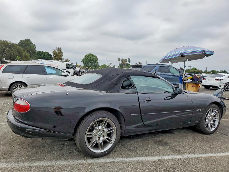 2002 Jaguar XK-Series VIN SAJDA42C72NA23041 COPART salvage auction — SIDE, CA - SALVAGE CERTIFICATE, sold $925 on 2026-09-04 (photo 3)