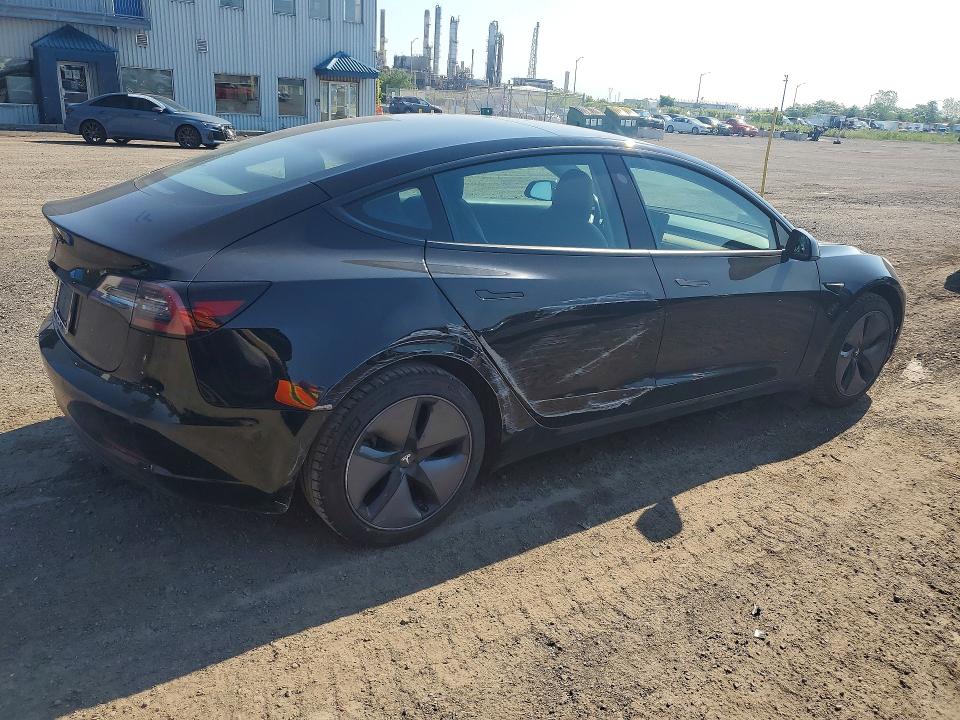 2019 Tesla Model 3 VIN 5YJ3E1EA0KF321336 COPART salvage auction — SIDE, QC - GRAVEMENT ACCIDENTE, sold $7,400 on 2026-09-08 (photo 3)