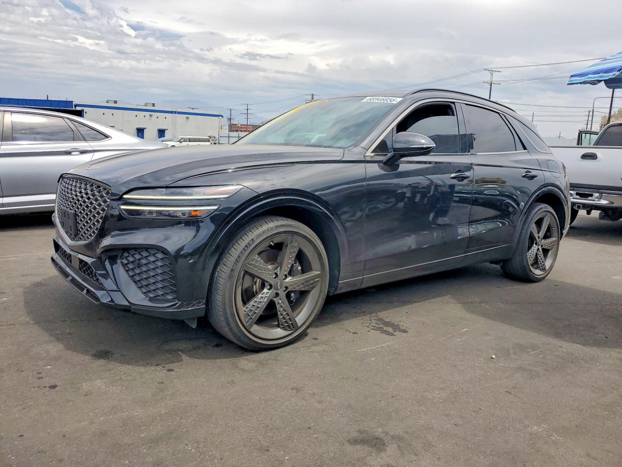 2023 Genesis GV70 VIN KMUMADTB3PU090876 — COPART salvage auction photo