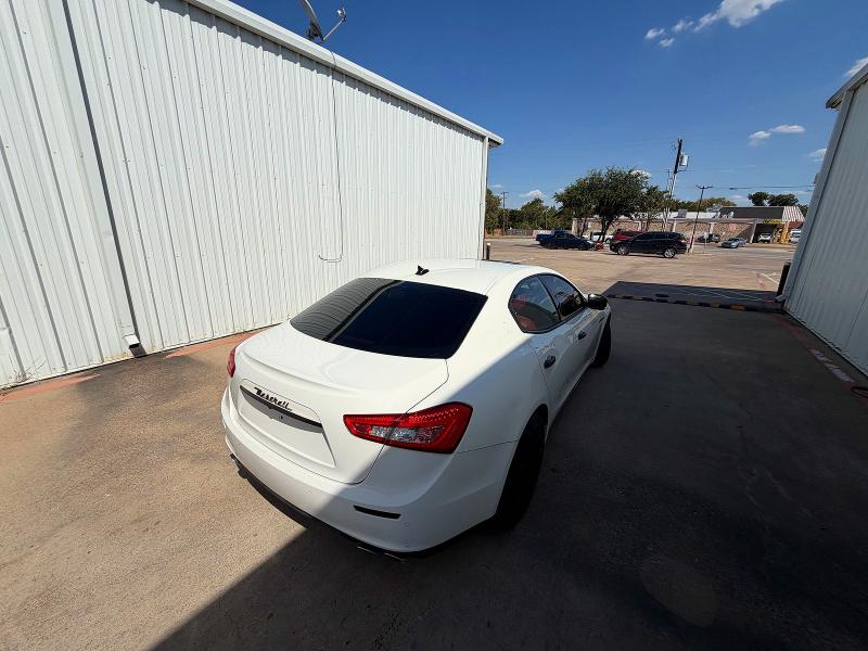 2015 Maserati Ghibli VIN ZAM57XSAXF1148865 COPART salvage auction — MINOR DENT/SCRATCHES, Tx - Certificate Of Title (P), sold $2,900 on 2026-08-20 (photo 4)