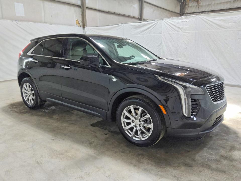 2023 Cadillac Xt4 VIN 1GYAZAR49PF107913 COPART salvage auction — MINOR DENT/SCRATCHES, TN - CERTIFICATE OF TITLE, sold $14,300 on 2026-08-20 (photo 4)