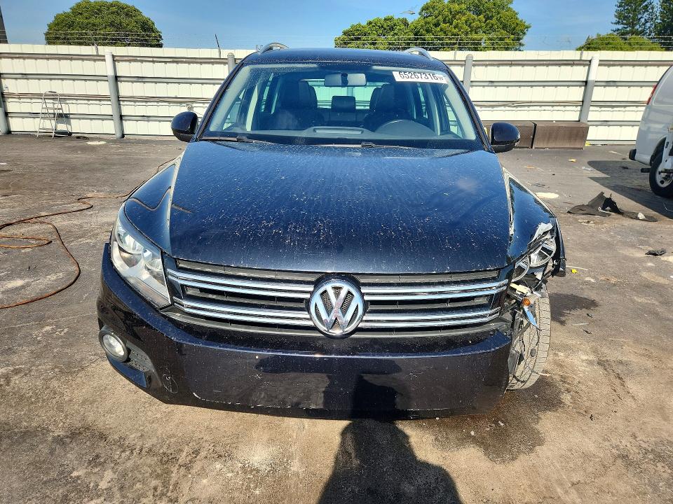 2013 Volkswagen Tiguan VIN WVGAV3AX8DW600900 COPART salvage auction — FRONT END, FL - CERTIFICATE OF TITLE, sold $1,050 on 2026-08-17 (photo 5)