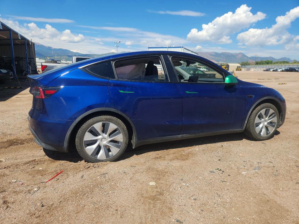 2023 Tesla Model y VIN 7SAYGDEE8PF863637 COPART salvage auction — ALL OVER, CO - SALVAGE TITLE, sold $7,100 on 2026-09-04 (photo 3)