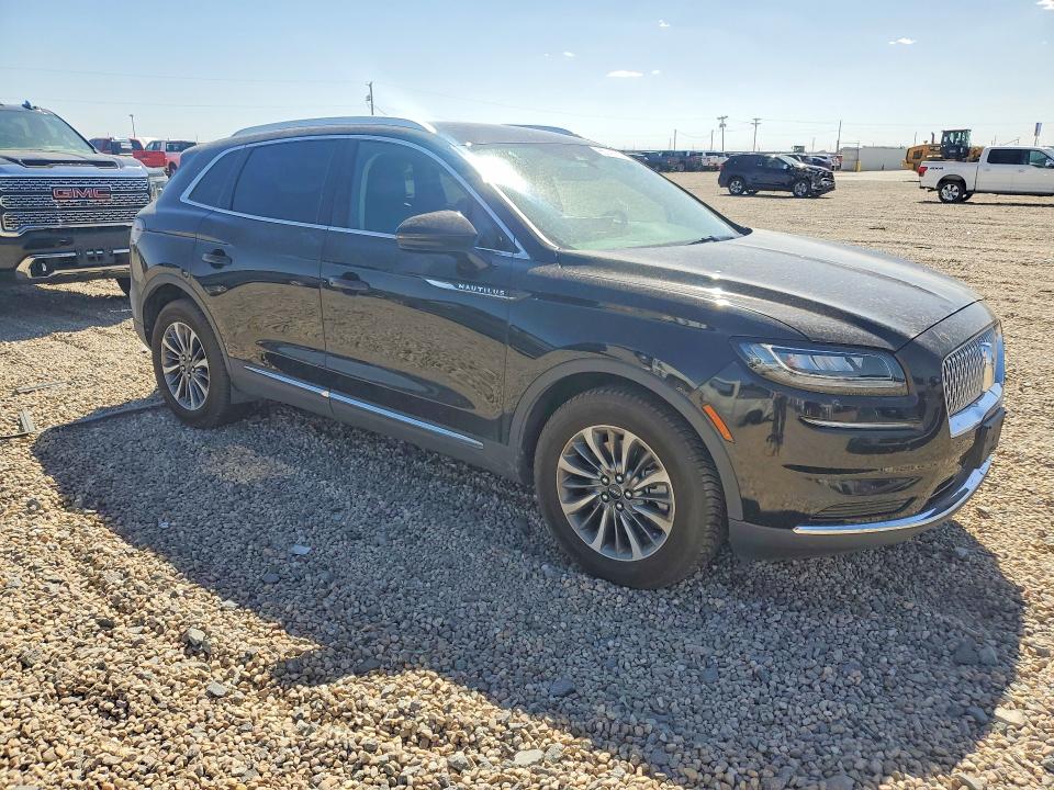2021 Lincoln Nautilus VIN 2LMPJ8J92MBL17452 COPART salvage auction — MECHANICAL, Tx - Certificate Of Title, sold $7,500 on 2026-09-01 (photo 4)