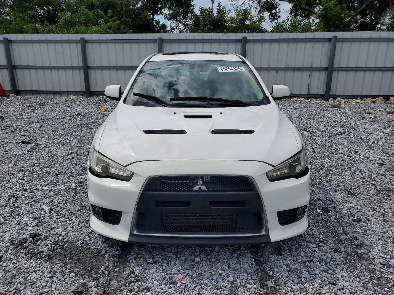 2013 Mitsubishi Lancer VIN JA32W5FV2DU011733 COPART salvage auction — Front End, FL - CERTIFICATE OF TITLE, sold $13,900 on 2026-09-09 (photo 5)